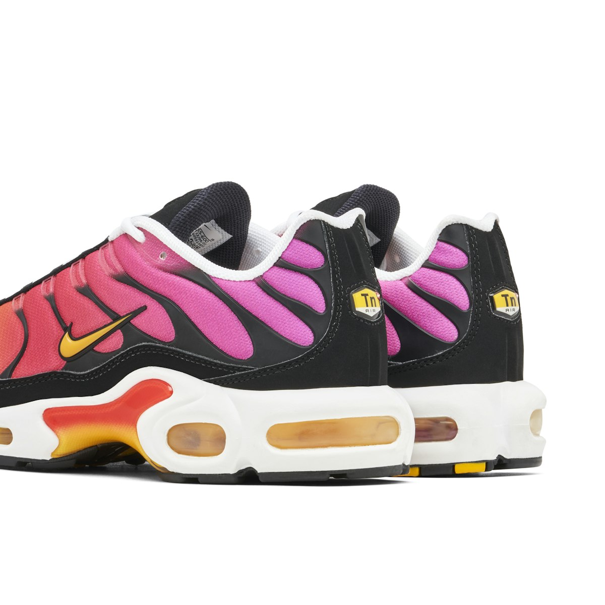 pink yellow and blue air max plus