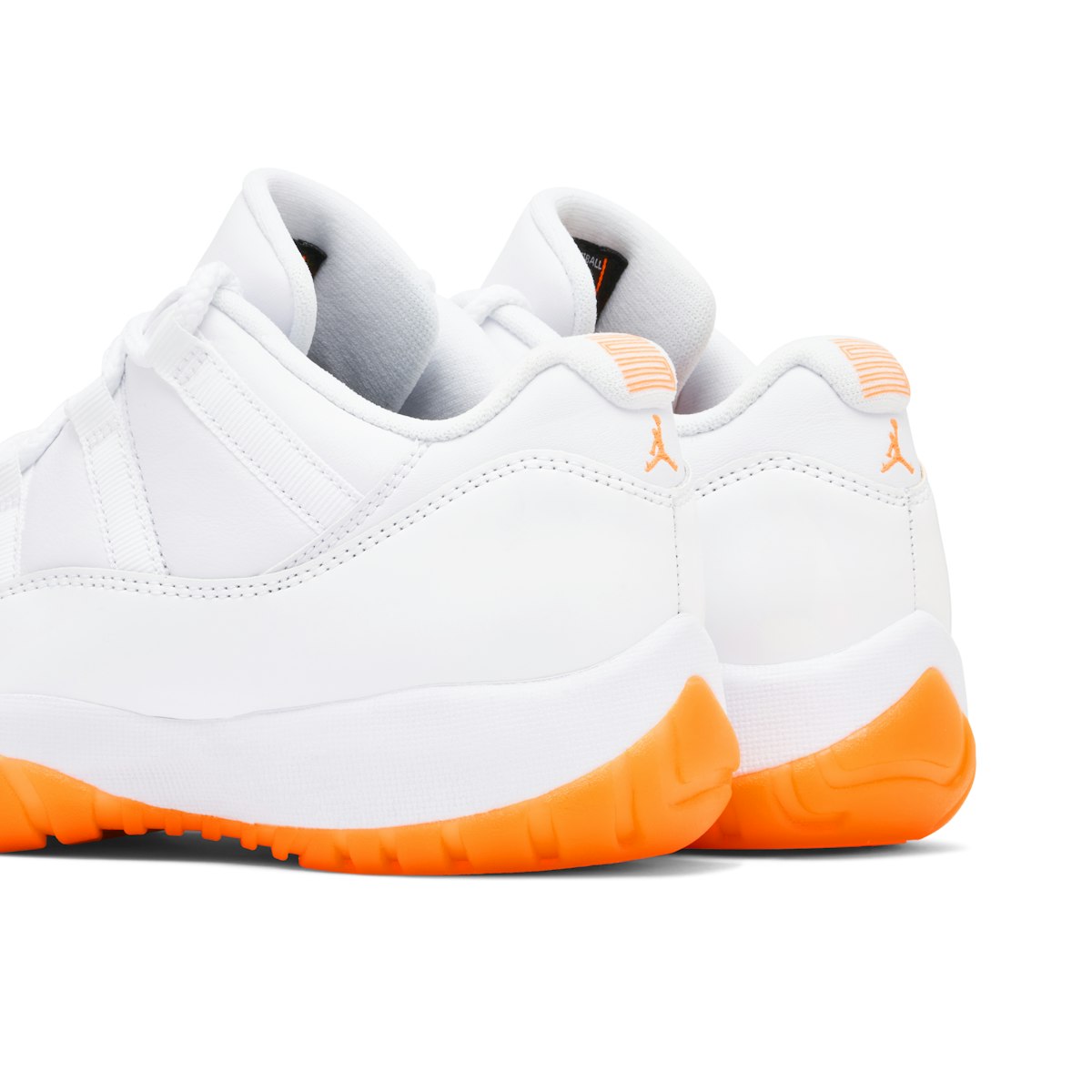 jordan 11 low orange and white